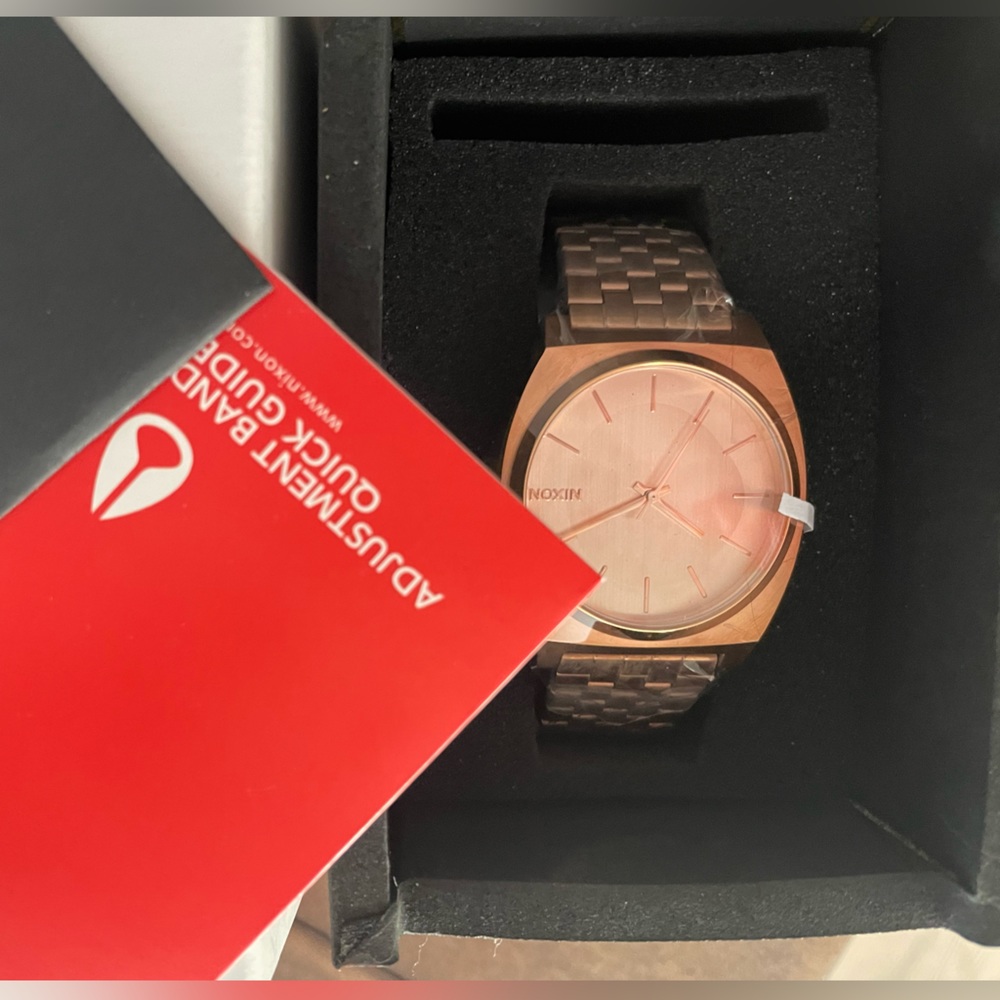 Nixon watch Time Teller, rose gold.